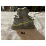 Isabel Bloom kids sitting back to back