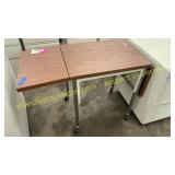 Folding table on wheels