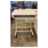 Rolling computer desk