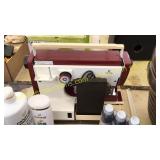 Clock, Viking sewing machine, toiletries