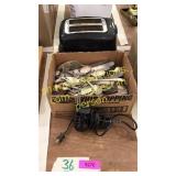 Toaster, box of silverware, soldering tool