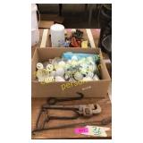 Box of lightbulbs, wrench, misc
