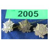 Three vintage pins
