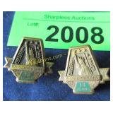 Two vintage pins with Statue of Liberty