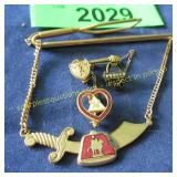 Four vintage historic pins