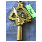 Large brass fraternity wall decoration