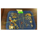 Tray of assorted necklaces and pendants