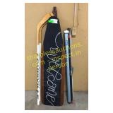 Ironing board, project screen, hockey sticks