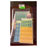 3 sheets of mint stamps