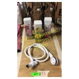 Tins, candle holders, pet shower head