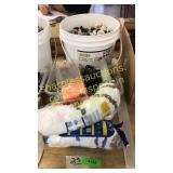 Boxes of security tags, mop heads, sponge