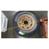 Goodyear wrangler tire LT245/75R16 on rim