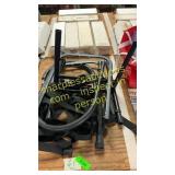 Metal stand w/ straps