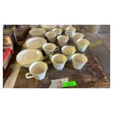 Tea cups and saucers, plates and bowls