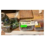 Bag of marbles, jar and containers of marbles