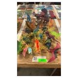 Multiple toy dinosaurs