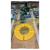 Yellow dishes and blue statue