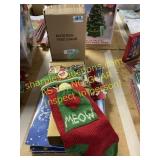Boxes, cards, stocking, tree stand