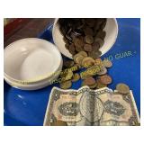 Canister of foreign coins and dollar