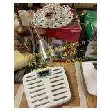 Yule slide, bathroom scale, lamp