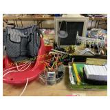 Sled, diaper bag, office supplies