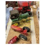 Toy tractors, 2 International, 1 John Deere