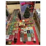 Holiday tree, gift wrap and bags