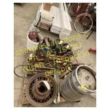 Pallet of battery chargers, wheels, shovels, eyc