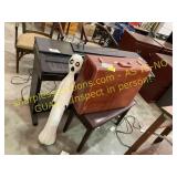 Yamaha keyboard, suitcase, statue