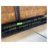 Two gutter guard brushes