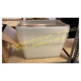 Six plastic containers with lids