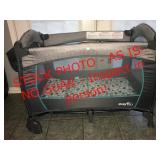 Evenflo portable babysuit DLX playard - tore