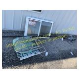 Garage door opener, window, chairs