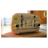Used Haden 4 slot toaster off white has dent