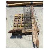 Broom, log roller, wood skis , tomato cages