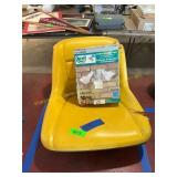 Lawn mower seat, motion light