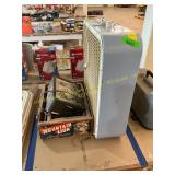 Fan, fence charger, wood crates