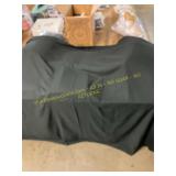 Shirt size unknown, black sheets.
