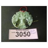 Hand carved Oriental jade pendant
