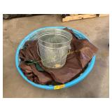 Swimming pool, tarp, metal can