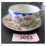 Vintage hand painted Oriental cup and saucer
