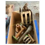 Wooden pulleys, yarn rolls
