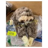 Cock-a-doodle-hooooooo! & a sloth stuffed animal