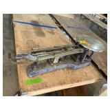Triple beam scale