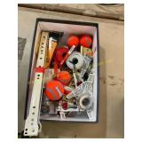 Pet tennis balls, wire, and various tools