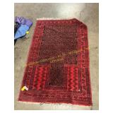 Red woven rug
