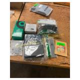 Journal, cards, earbuds, car panel, seeds, magnet