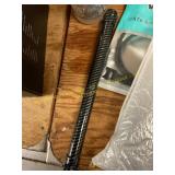Some kind of pipe and an Ethernet cable