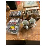 6 beer steins, bag of 12 dvds, & misc