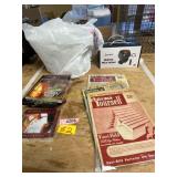 Bag of 25 dvds, 2 heated neck wraps, & misc